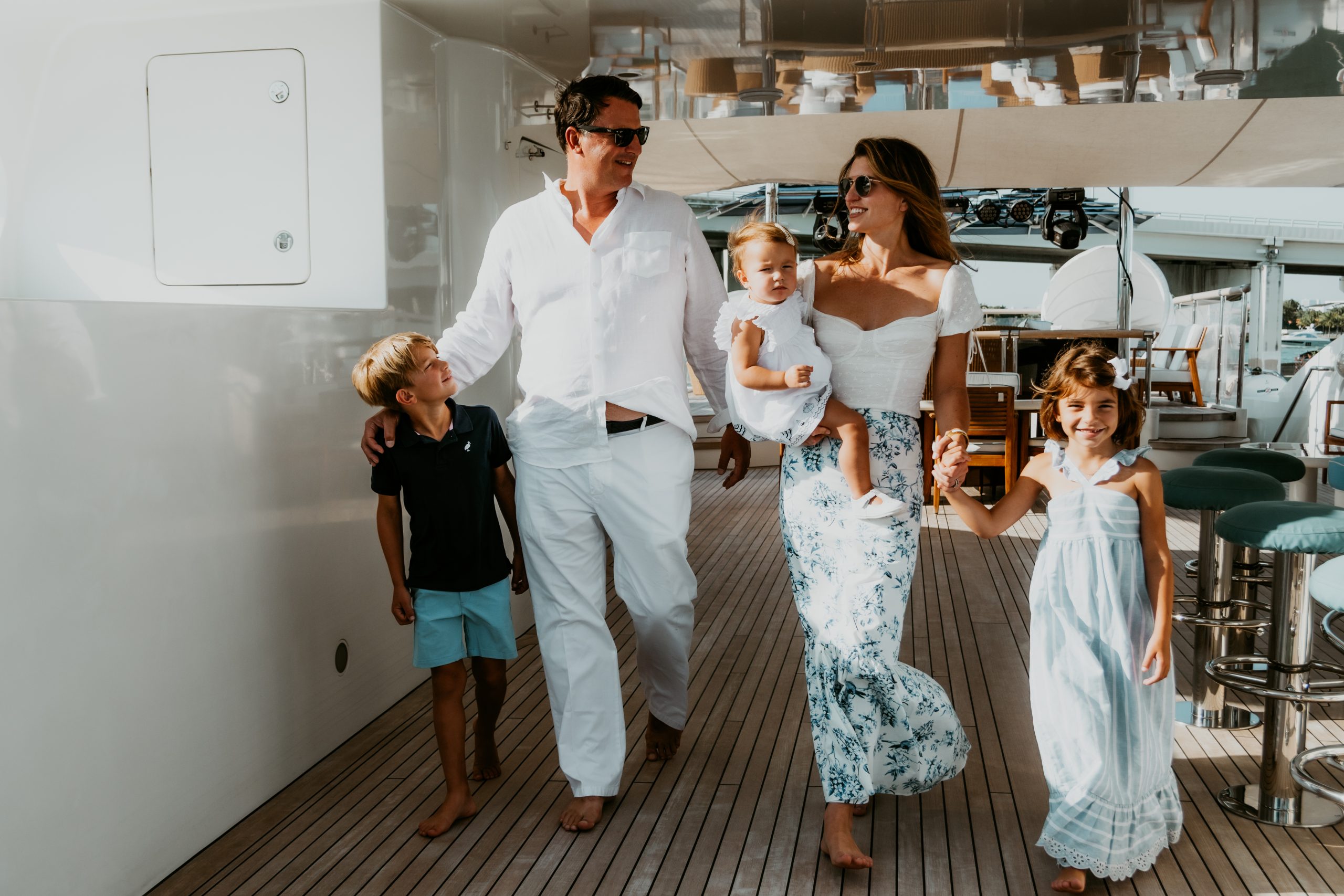 Family boarding a yacht-Yacht Management-Kitson Yachts