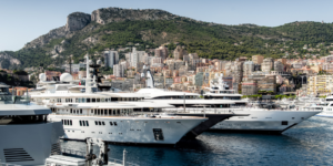 Top Tips: The yachts are docked in the water for an exclusive yacht charter experience.